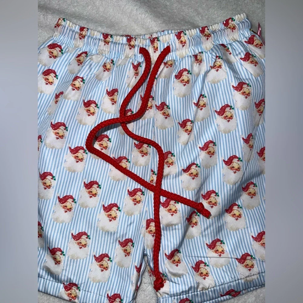 Cecil and Lou Santa Claus print swim trunks, size 7, NWT
